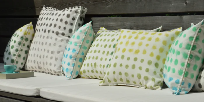 Cushions are also a great outdoor accessory – provided they are made of water-repellent fabric.